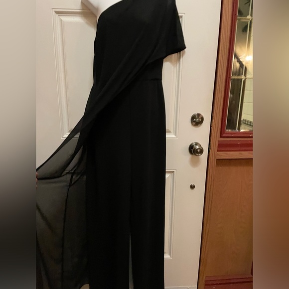 Le chateau one Shoulder black Jumpsuit with a black sheer overlay. Very Elegant - Picture 2 of 14